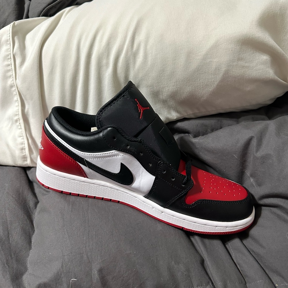 Jordan Air 1 Low in White, Black, and Red - Picture 13 of 14